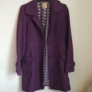 Purple coat with cute swirl design